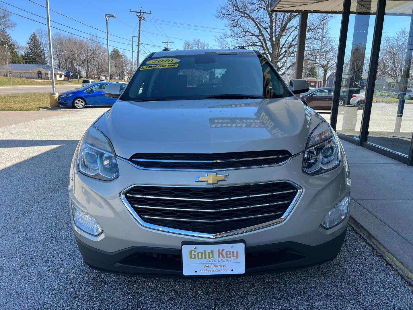 2016 Champagne Silver Met Chevrolet Equinox LT 2WD (2GNALCEK3G1) with an 2.4L L4 DOHC 16V FFV engine, 6-Speed Automatic transmission, located at 1633 W Kimberly, Davenport, IA, 52806, (563) 323-5341, 41.559456, -90.598732 - Photo#1